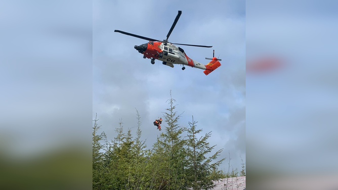 U.S. Coast Guard helping rescue construction workers.